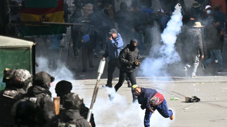 Bolivia's President slashes salary by 50% to quell protests.